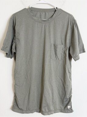Vuori Heathered green tradewind tee pocket performance shirt